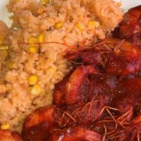 Camarones A La Diabla · Spicy (devil)shrimps served with rice and beans.