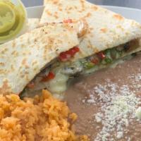 Veggie Quesadilla  · Mushrooms, peppers,onions.
Served with rice & beans.
