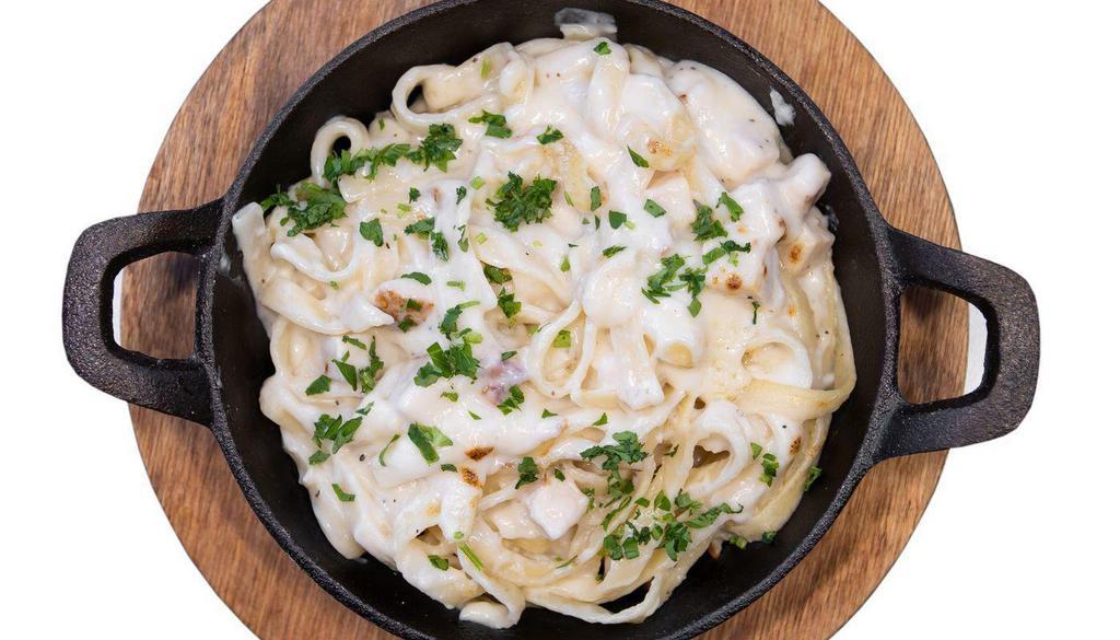 Chicken Fettuccine Alfredo · Fettuccine noodle with our house-made Alfredo, oven-roasted Boar’s Head chicken breast sprinkled with fresh parsley.