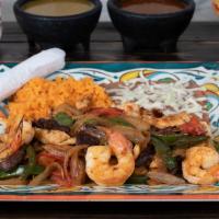 Fajitas Mix · Chicken, shrimp and steak. Served with rice and beans.