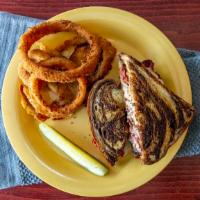 Reuben Sandwich · Tender slow roasted corned beef served with sauerkraut, swiss cheese and thousand island dre...