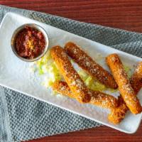 Homemade Mozzarella Sticks · Hand battered cheese sticks and deep fried. Served with a side of warm marinara dipping sauc...