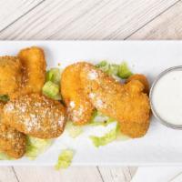 Jalapeno Poppers · Deep fried jalapeno peppers stuffed with seasoned cream cheese served with a side of ranch s...
