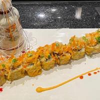 25 Out Of Control Roll · season baked-scallop on deep-fried crabmeat ,creamcheese with eel sauce and spicy mayo