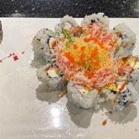 17 Volcano Roll · crab stick,avocado,cream cheese,topped with snow crab scallion and crunchy caviar eel sauce