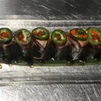 24 Waynes Roll · fresh salmon, tuna ,yellowtail,white tuna,cucumber topped with marinated crabmeat,seared tun...