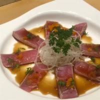 Tuna Tataki · Seared tuna sliced and scallion served w. ponzu sauce.