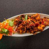 Monagadi (Cs) Gobi · Deep fried Gobi tossed in spicy south Indian sauce.
