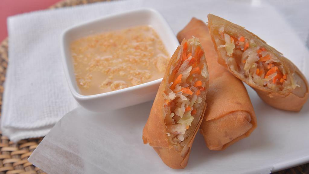 Spring Roll (3 Pieces) · Shredded cabbage, carrots, transparent noodles wrapped in an egg roll shell.