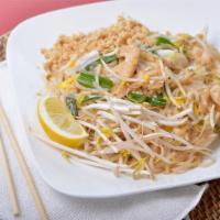 Pad Thai · Gluten-free. Sautéed rice noodles with eggs, beansprouts, and green onions, topped with crus...