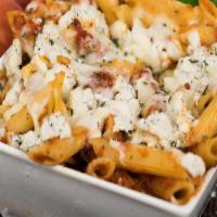 Mostaccioli Alforno · Penne tossed with marinara, ricotta cheese and baked with mozzarella. Served with garlic bre...