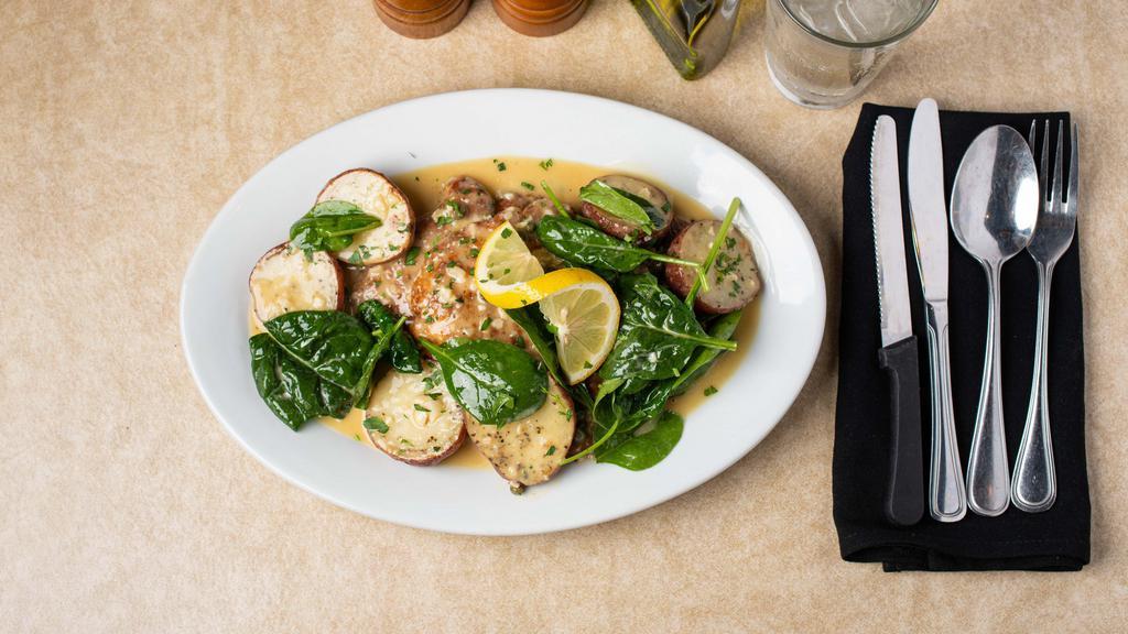 Chicken Limone · Chicken breast sautéed in a spinach lemon butter sauce. Served on a bed of angel hair.