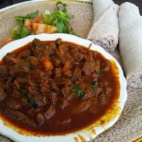 28 Awaze Tibs · Cubed tender beef marinated cooked with tomato, jalapeño, garlic, and berbere. Popular and s...