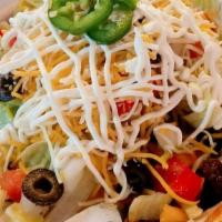 Loaded Curly Fries · Topped with your choice meat, lettuce, onion, tomato, black olives, cheese, sour cream and j...