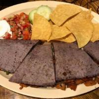 La Chula · Large quesadilla in homemade blue corn tortilla, stuffed with grill mix cheese peppers, and ...