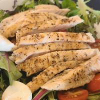 Chicken Ceaser Salad · Crisp romaine lettuce tossed in our creamy parmesan Caesar dressing, topped with sliced gril...