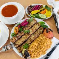 Chicken Shish Kabob · Fresh ground chicken mixed with onion, parsley and spices grilled on a skewer