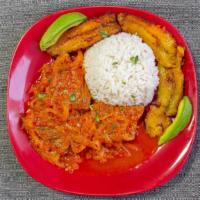 Sobrebarriga En Salsa · Flank steak grilled or cooked with house special tomato sauce served with rice, sweet planta...