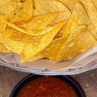 Chips & Salsa · Our crispy golden home made chips and our home made tomato salsa