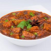 Lamb Curry · Boneless tender lamb cooked in a spiced tomato sauce with onion and freshly minced ginger an...