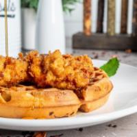 *Chicken & Waffle · Our Belgium waffle infused with bacon and topped with our handmade buttermilk fried chicken ...