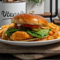 *Crispy Chicken Sandwich · Tender hand breaded chicken breast layered with ranch dressing, lettuce, tomato and sliced p...