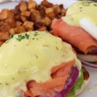 Classic Benedict · Griddled Canadian bacon, poached eggs on a toasted English muffin, drizzled with creamy holl...