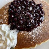 Lemon Blueberry Pancake · Lemon infused batter, fresh blueberries, dusted with powdered sugar and a dollop of whipped ...