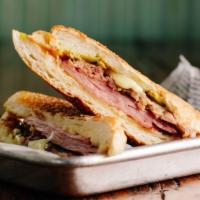 Cubano By 90 Miles Cuban Cafe · By 90 Miles Cuban Cafe. Ham, roast pork, Swiss cheese, pickle, and mustard. Contains gluten ...