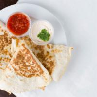 Meat Quesadilla · Salsa and sour cream on the side, comes with mild salsa and chips.