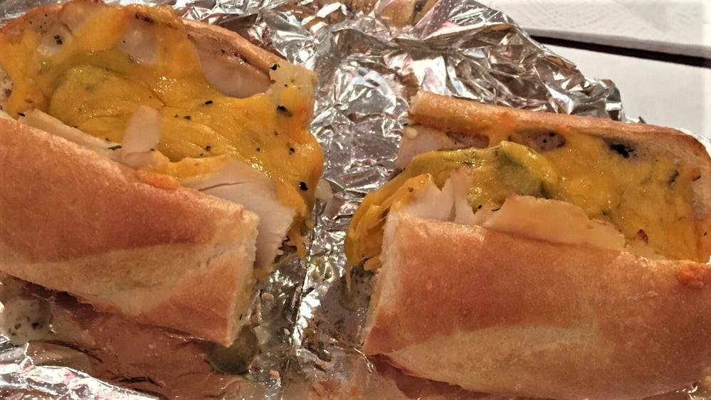 Dave’S Far Out Chicken · Juicy chicken, Daves hot sauce, onions, Cheddar cheese, hot peppers, herbs, and Daves cosmic sauce.