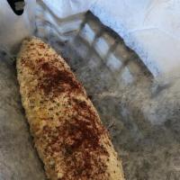 Cali Corn · Juicy corn on the cob, brushed with mayo, sprinkled with Parmesan cheese along with a cilant...