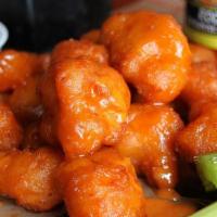 Buffalo Cauliflower · NEW!!!  A generous portion of fried cauliflower shaken in your choice of wing sauce. Served ...
