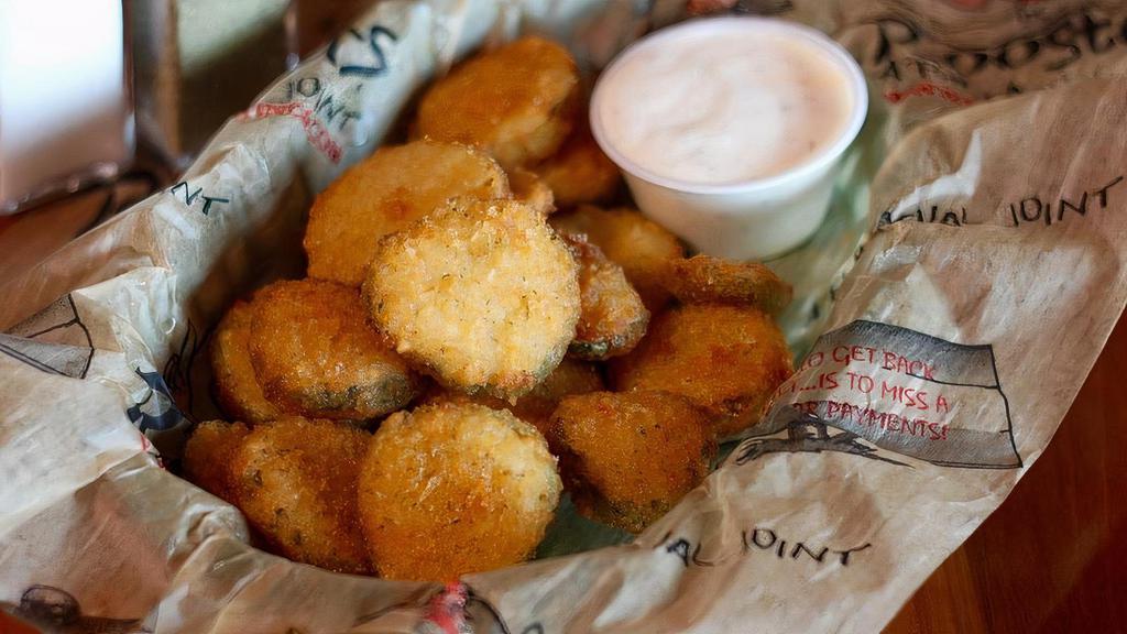Fried Pickles · Breaded Pickle Chips with homemade Ranch Dressing.