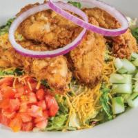 Fried Chicken Salad - Full · Fried chicken tenders over mixed lettucewith cheddar cheese, cucumbers, red onions and tomat...