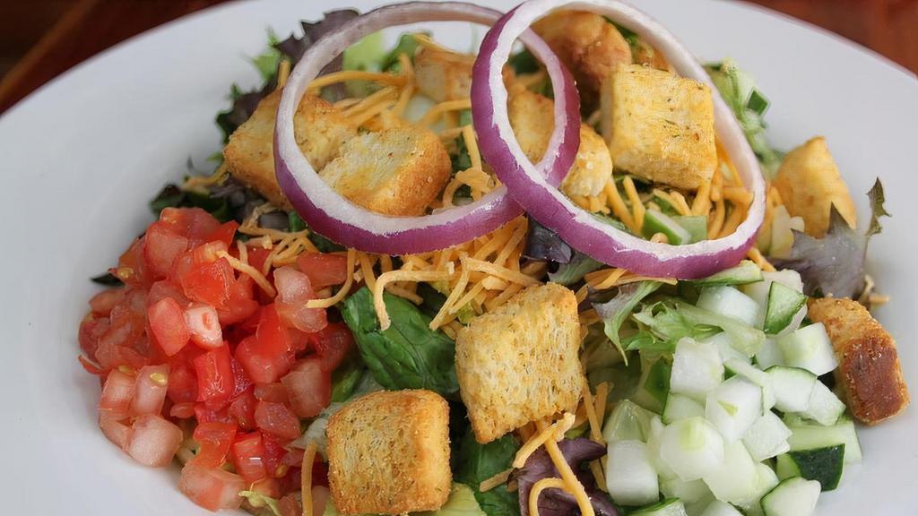 Garden Salad - Full · Mixed lettuce, cheddar cheese, cucumbers, red onions, tomatoes and croutons.
