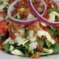 Red Rooster Salad - Full · Mixed lettuce, egg, bacon bits, cucumbers,red onions and tomatoes with Red RoosterDressing.