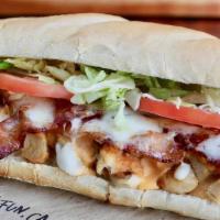 Chicken Bacon Ranch Sub · Seasoned chicken, bacon, lettuce andtomatoes drizzled with Roosters SpicyRanch. Topped with ...