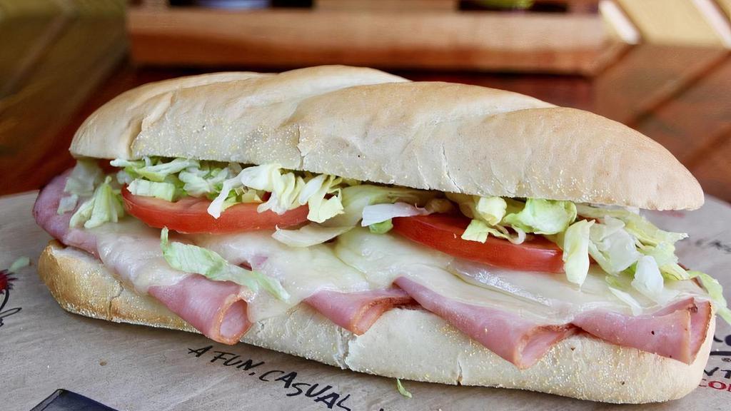 Ham & Swiss Sub · Smoked ham, lettuce and tomatoes covered with melted Swiss and a blend of mozzarella and provolone cheeses.
