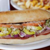 Italian Sub · Pepperoni, salami, smoked ham, garlicbutter, lettuce, tomatoes, red onions,banana peppers, a...
