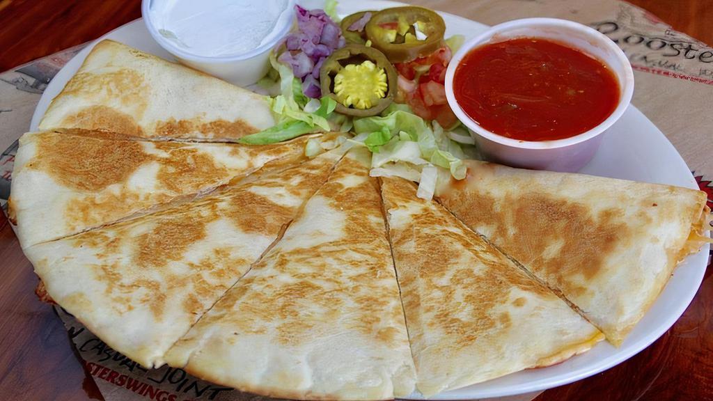 Quesadilla · Mozzarella, provolone and cheddar cheeses garnished with shredded lettuce, tomatoes, red onions and jalapeños.