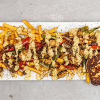 Parrilla Mix · Served over french fries. Chicken, steak, grilled cheese, grilled vegetables French fries.