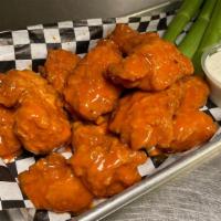 Chicken Nuggs (Boneless Wings) · Hand-breaded chicken breast nuggets. Tossed in wing sauce, or naked, and served with choice ...