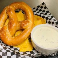 1/2 Order Jumbo Pretzel · 1 large Bavarian pretzel with white spinach queso + tortilla chips