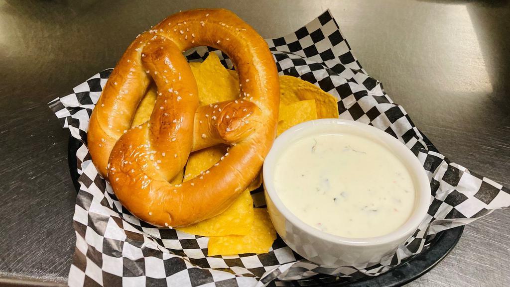 1/2 Order Jumbo Pretzel · 1 large Bavarian pretzel with white spinach queso + tortilla chips