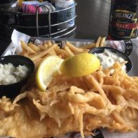 Beer Battered Fish & Chips · Giant-sized fried cod, choice of side, house tartar sauce