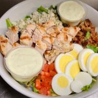Chicken Cobb Salad · Mixed greens, bacon, tomatoes, boiled egg, blue cheese, avocado ranch.