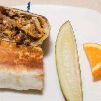 Steak Fajita Wrap · Philly steak, sautéed onions and peppers, Cheddar cheese, lettuce, tomato and sour cream.