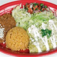 Enchiladas · Three corn tortillas rolled with your choice of meat or just cheese, topped with green or re...