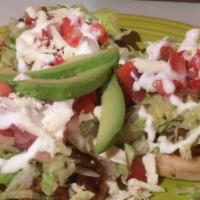 Sopes · Three homemade corn tortillas served with your choice of meat, topped with lettuce, pico de ...